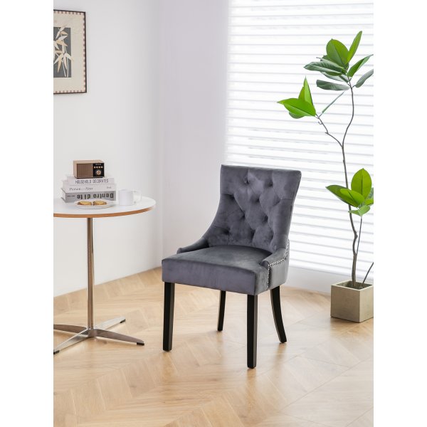 Grijze fluwelen eetkamerstoel met zwarte poten