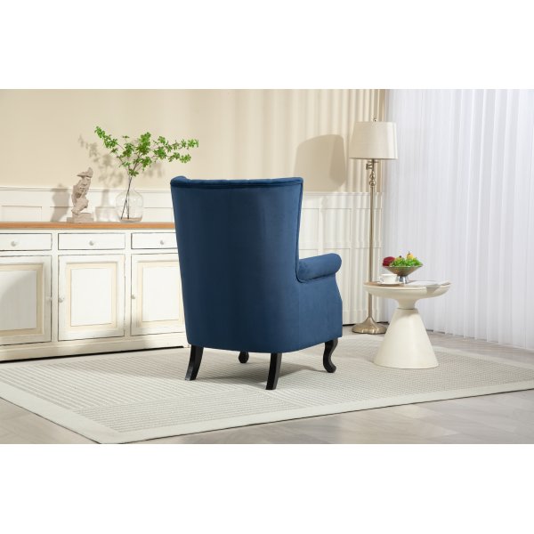 Öronlappsfåtölj i blått sammet Öronlappsfåtölj i blått sammet