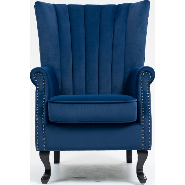 Öronlappsfåtölj i blått sammet Öronlappsfåtölj i blått sammet