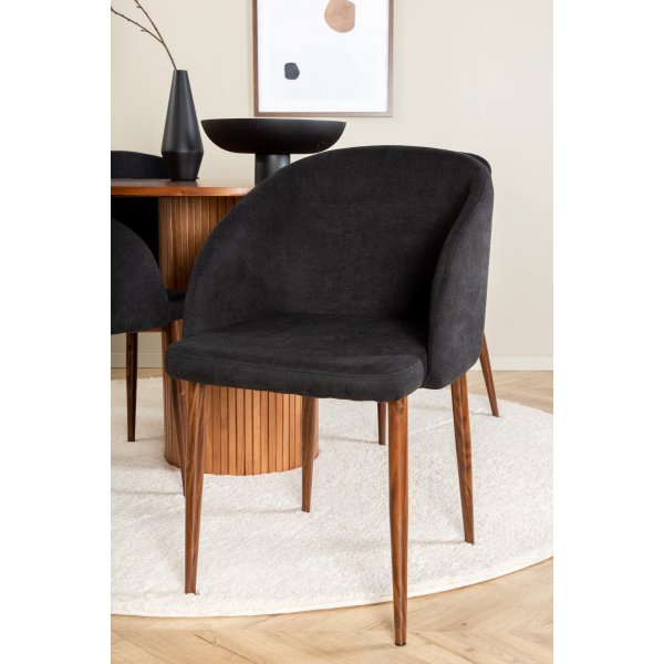 Bianca Matgrupp runt valnöt matbord med 4 st Arch svart stolar Bianca Matgrupp runt valnöt matbord med 4 st Arch svart stolar