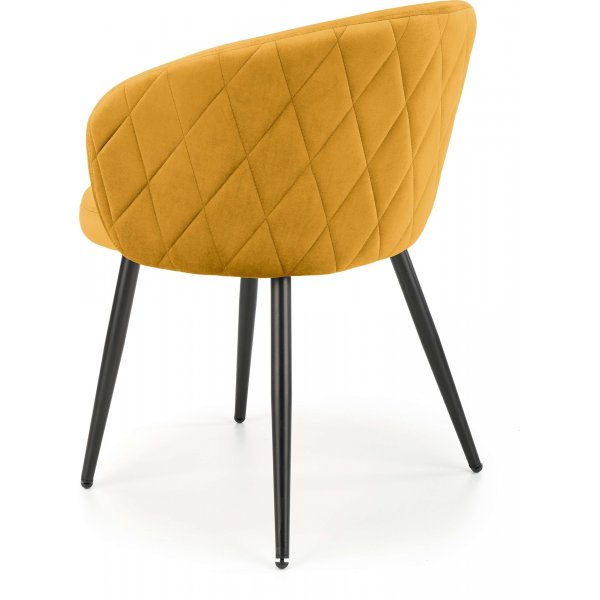 Fauteuil jaune avec pieds noirs