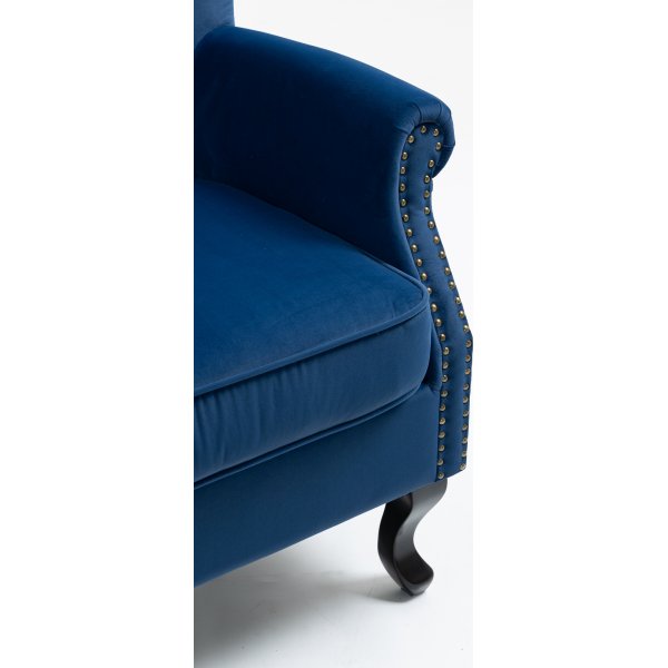 Öronlappsfåtölj i blått sammet Öronlappsfåtölj i blått sammet