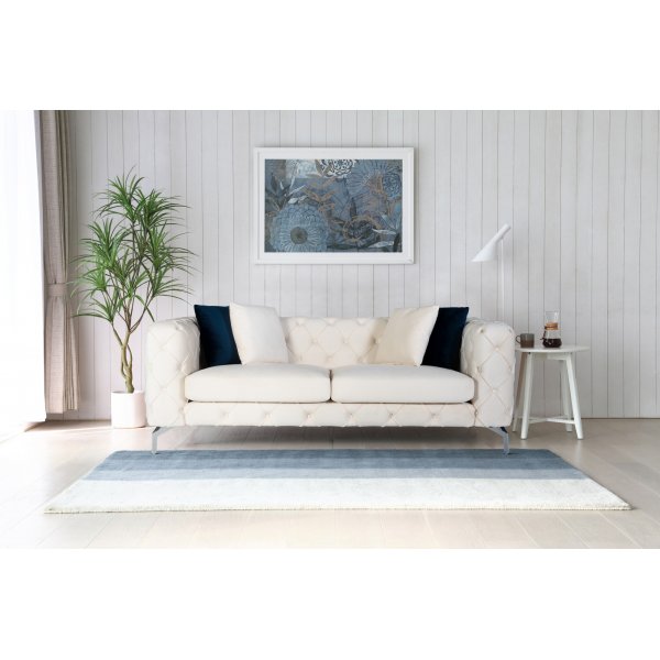 Como 2-zitsbank in beige fluweel met knopen + Textielreiniging voor meubels Como 2-zitsbank in beige fluweel met knopen + Textielreiniging voor meubels